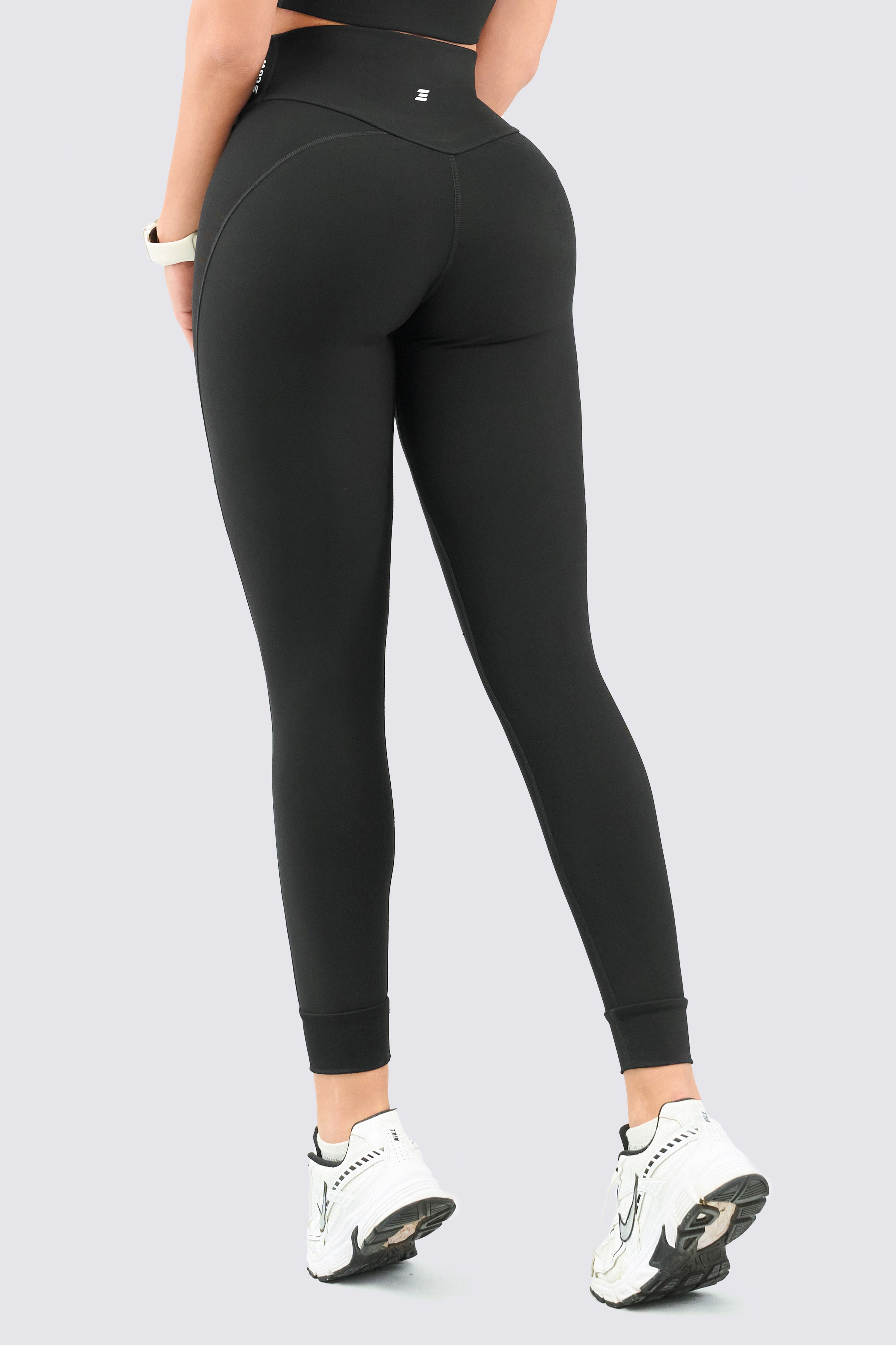 Black athletic leggings, high waist, perfect fit, and squat-proof. 