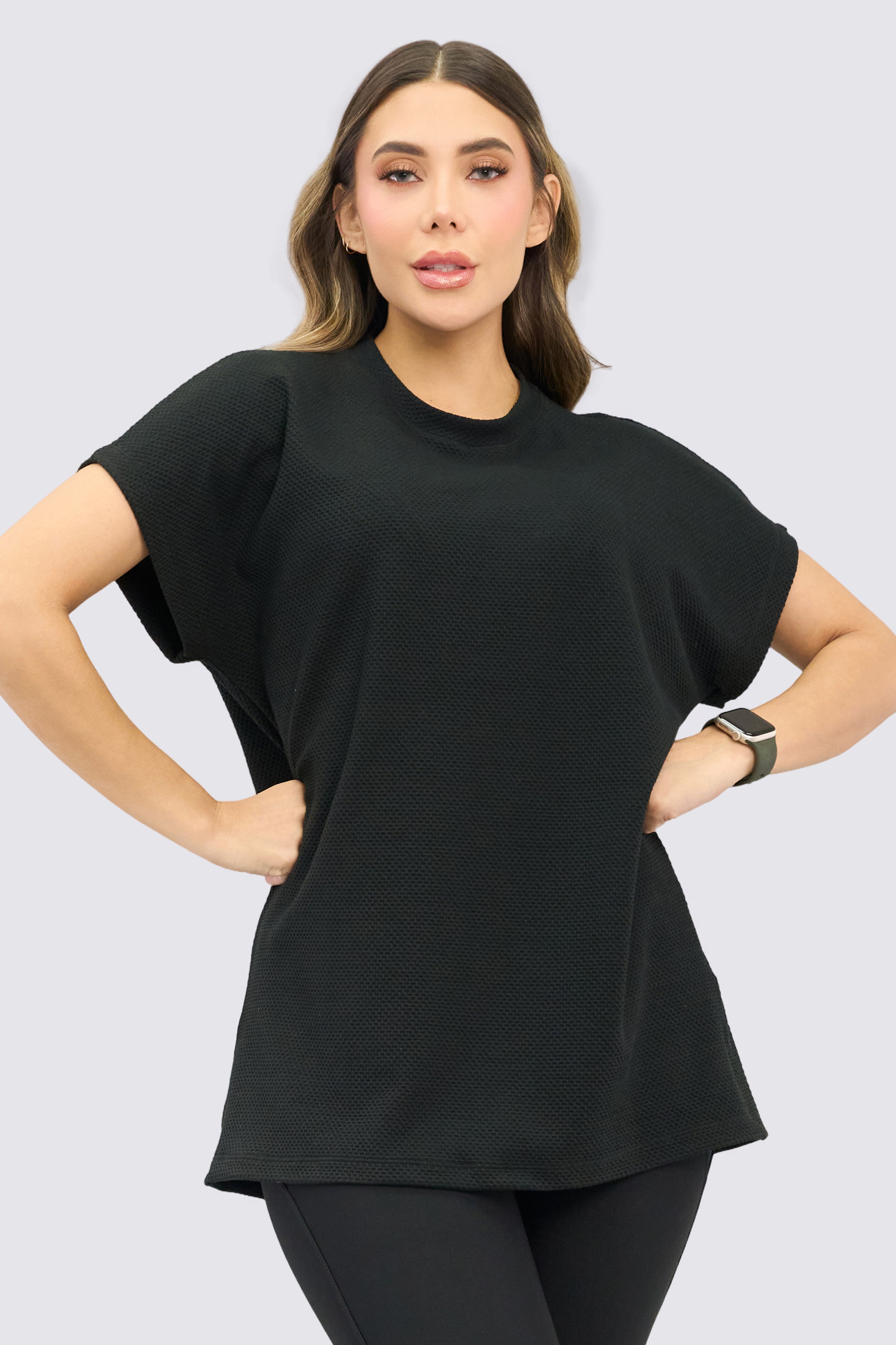 Black sports T-shirt, oversized style, and warm design. 