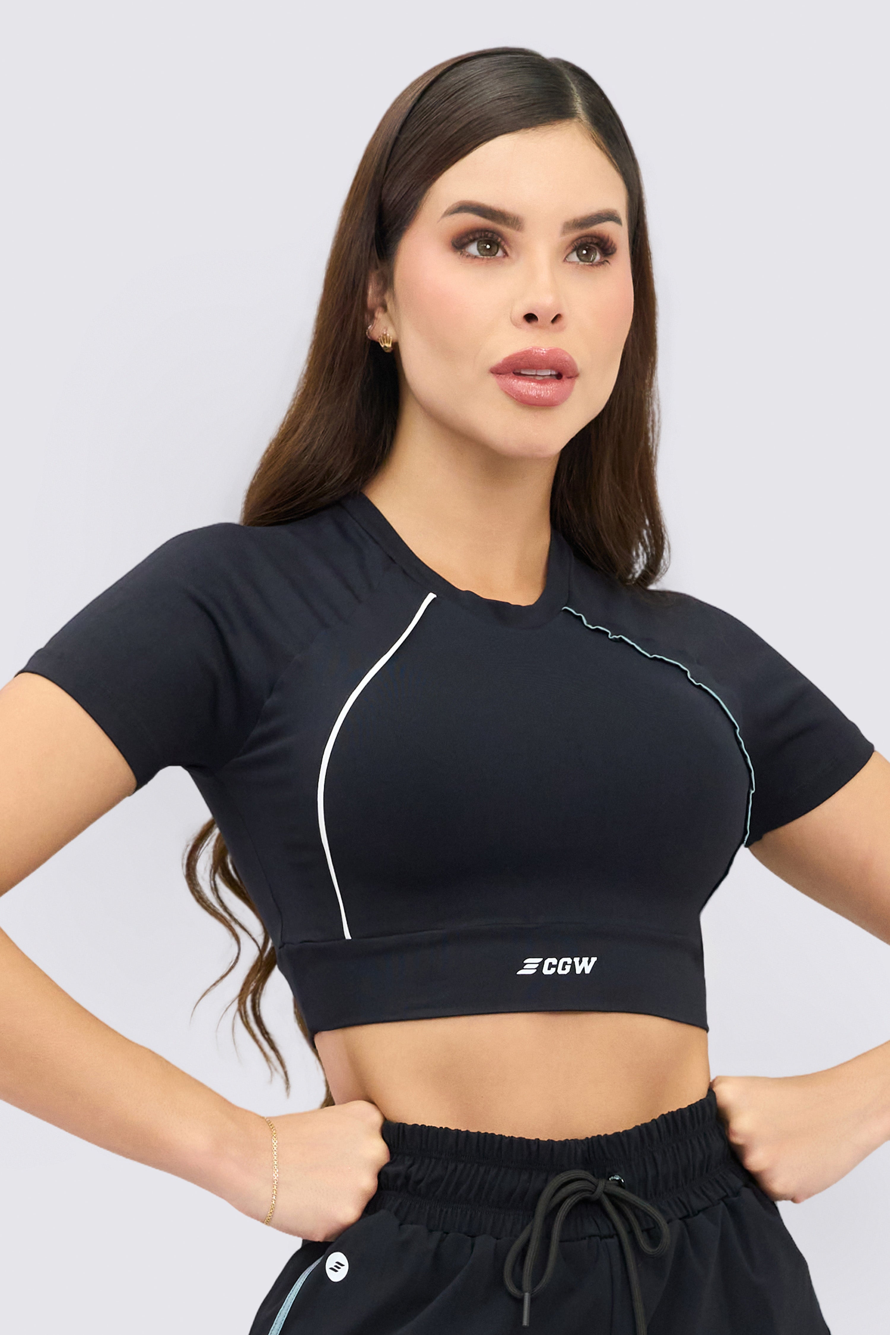 Black athletic crop top with a snug fit.