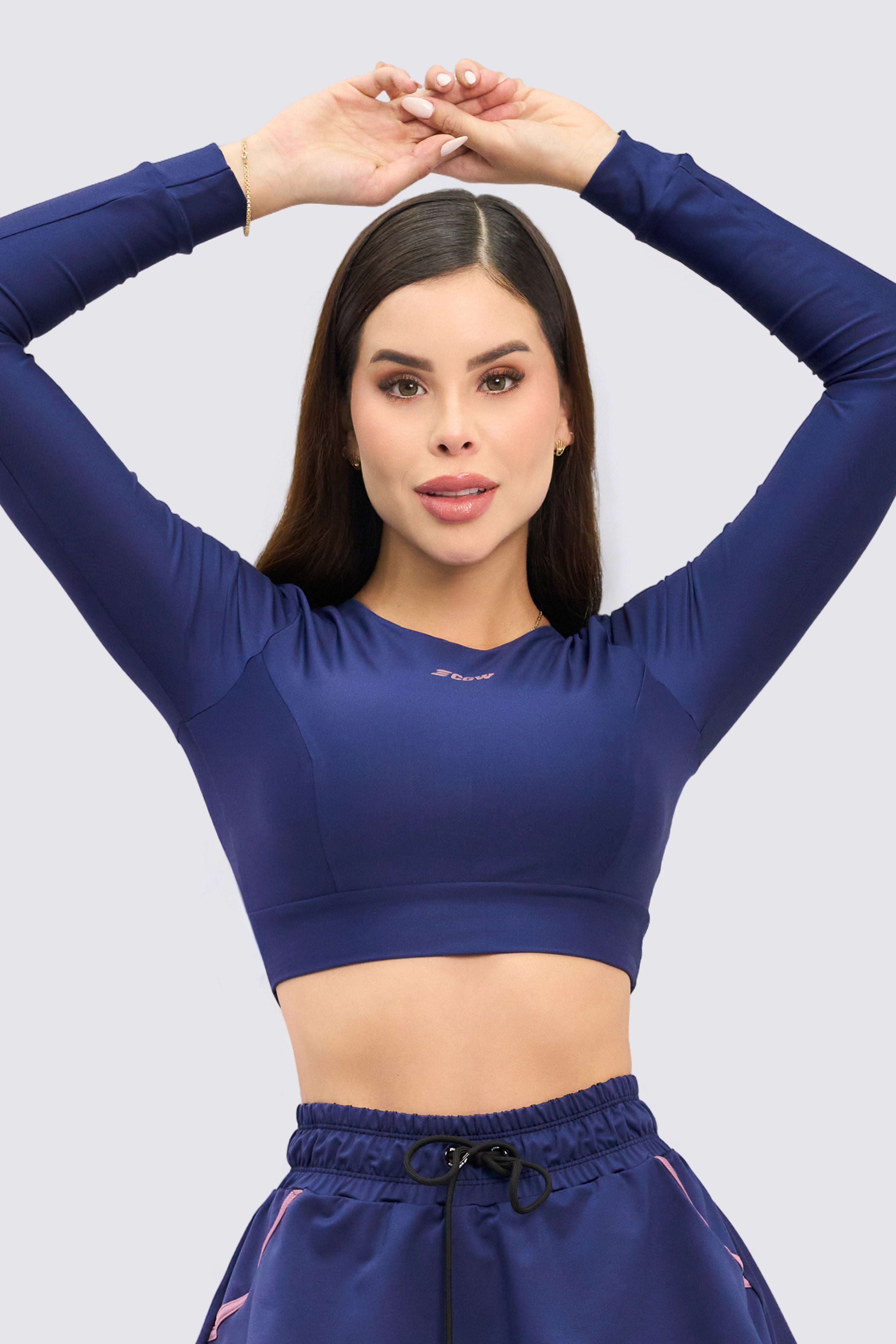 Navy blue, long-sleeved sports sweatshirt.