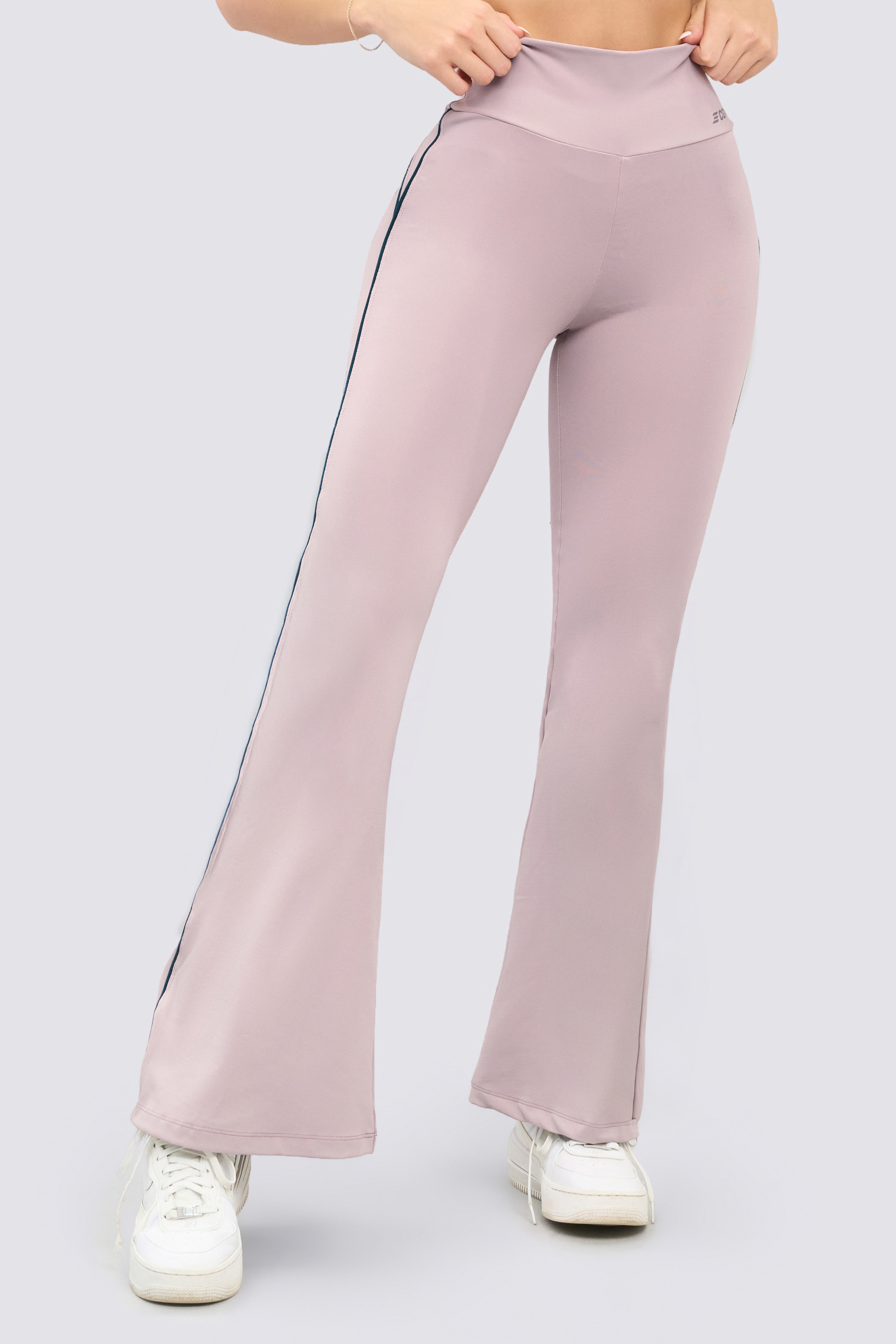 High-waisted, soft, and stretchy rosewood-colored flare leggings. 