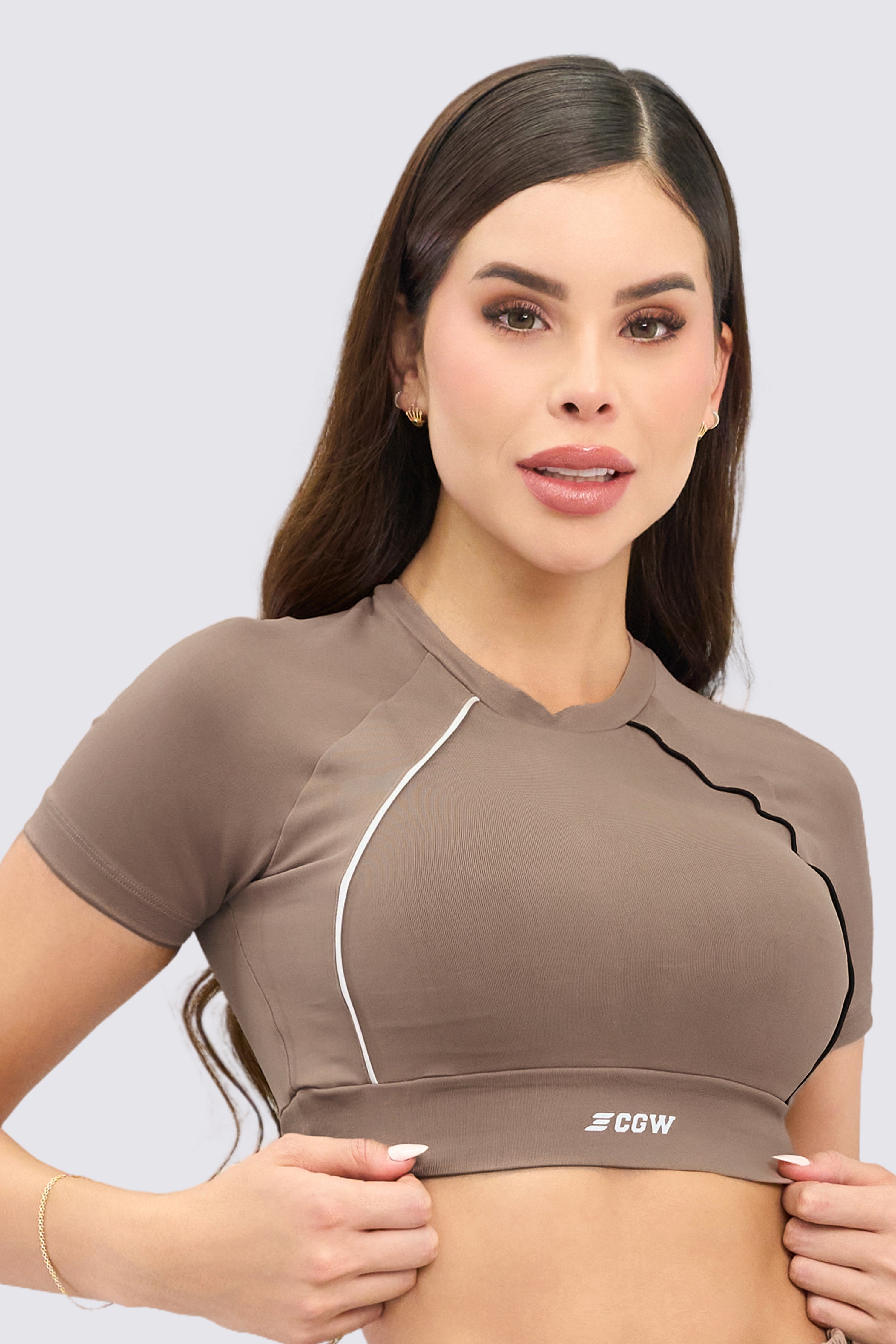 Mocha-colored athletic crop top with a snug fit. 