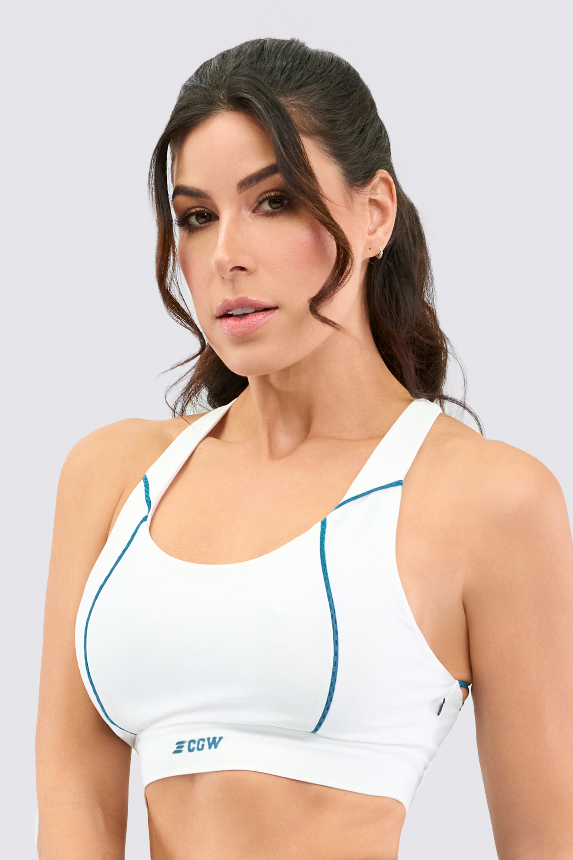Conquer your training with the CGW Flex Strappy Sports Bra: sculpted fit, quick-dry fabric, and a striking open-back look for unstoppable energy.
