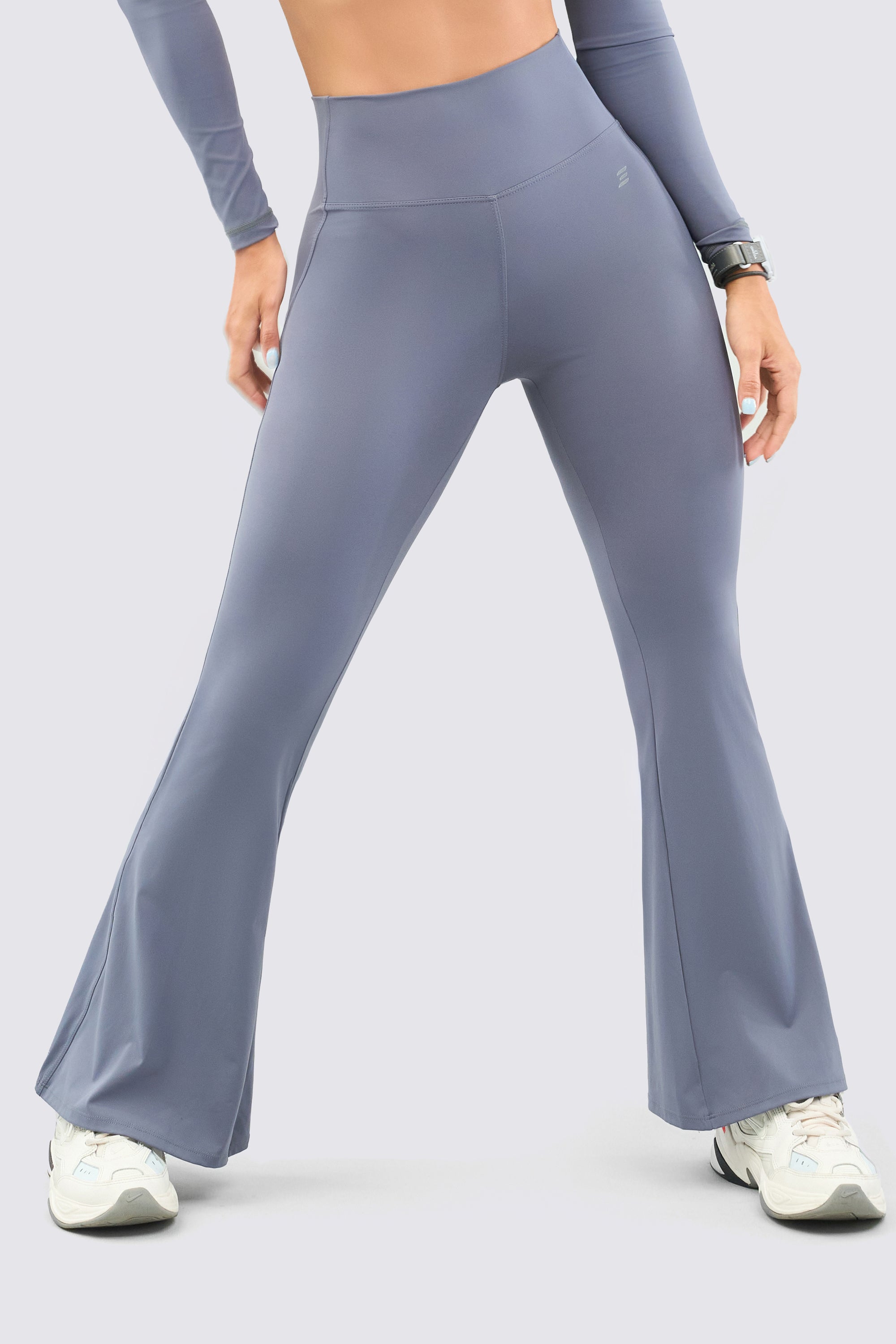 Grey leggings, with bell boot and high rise.